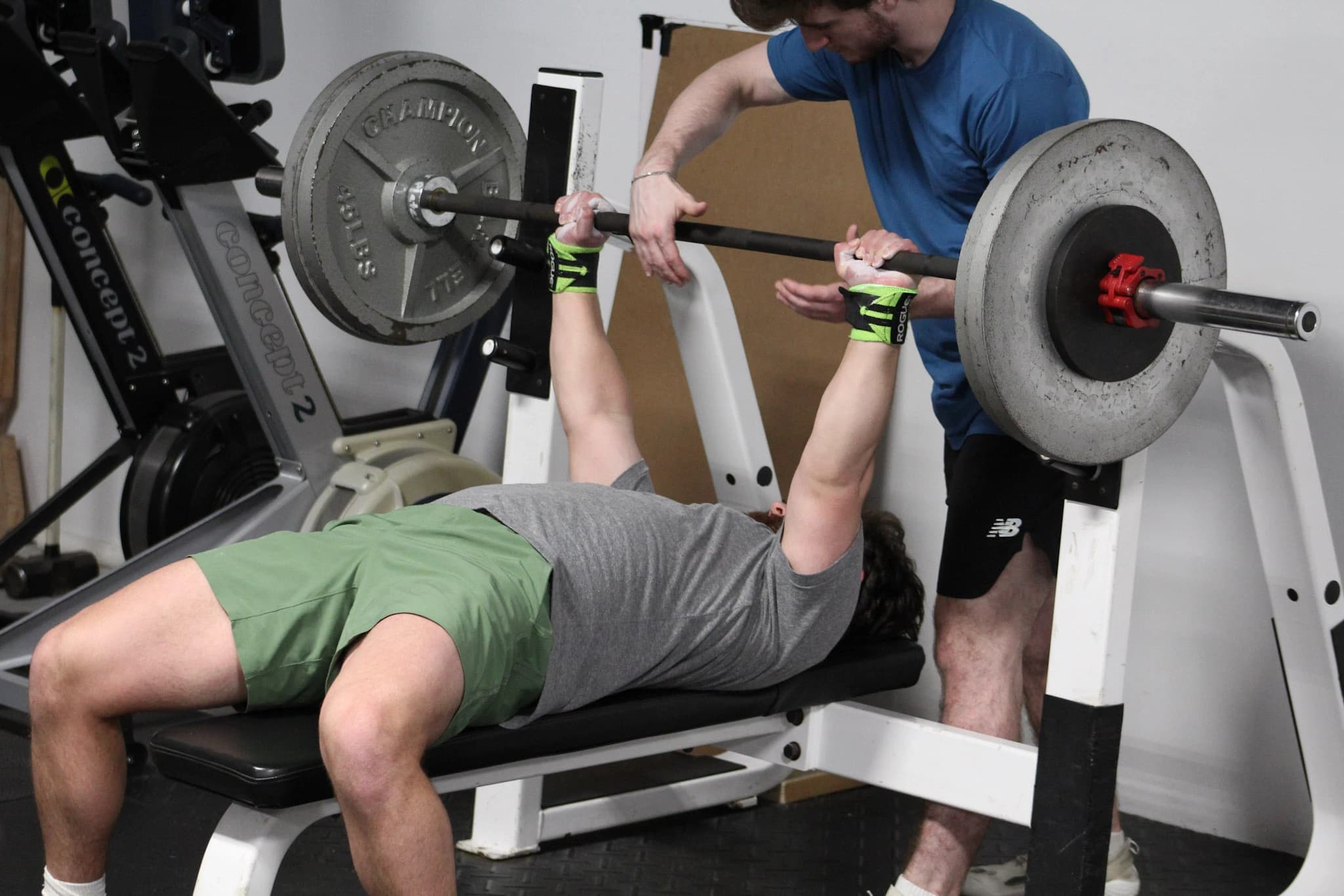 Nick spotting a personal training client during a bench press