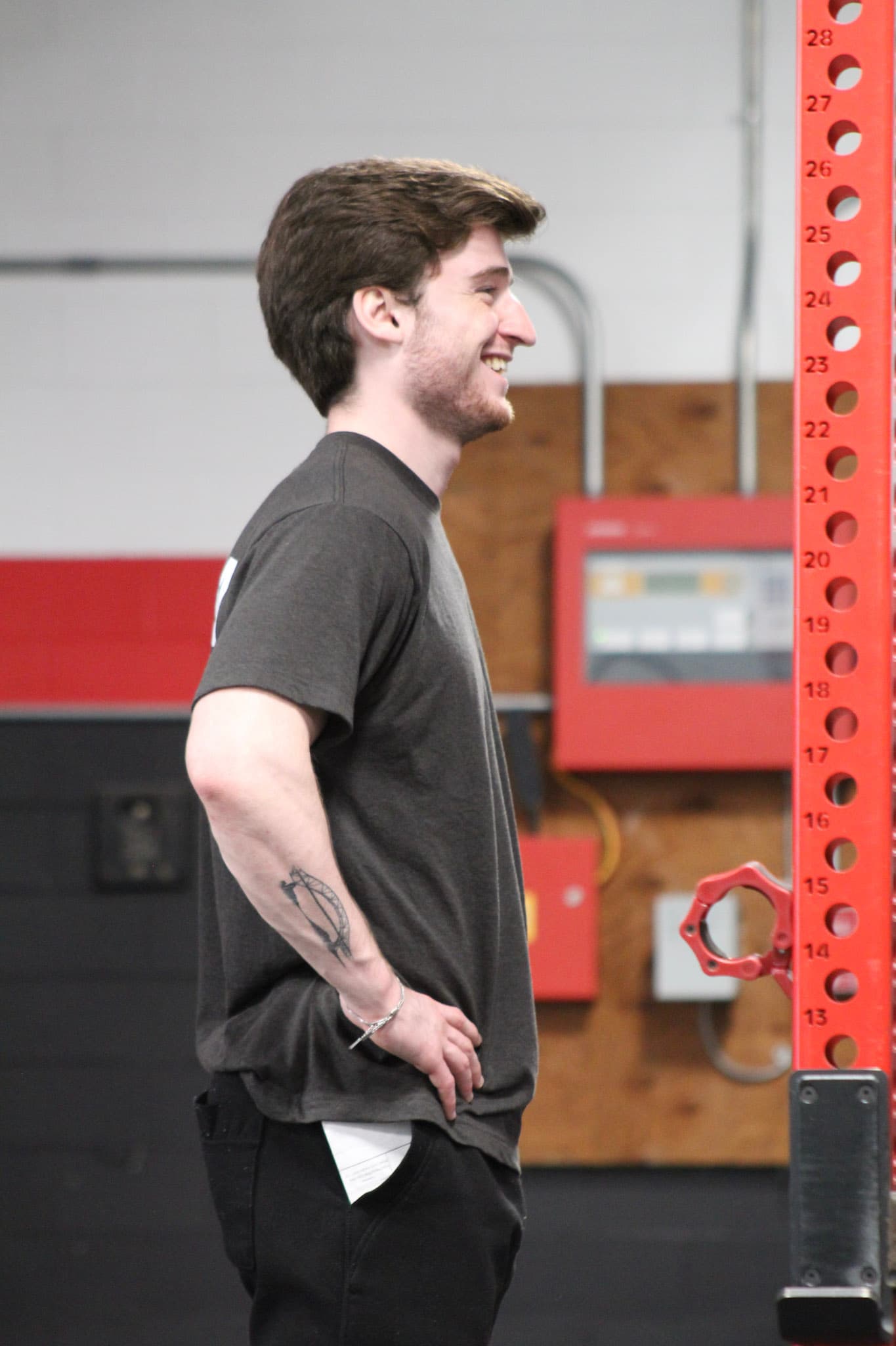 Nick Hardin smiling in the gym