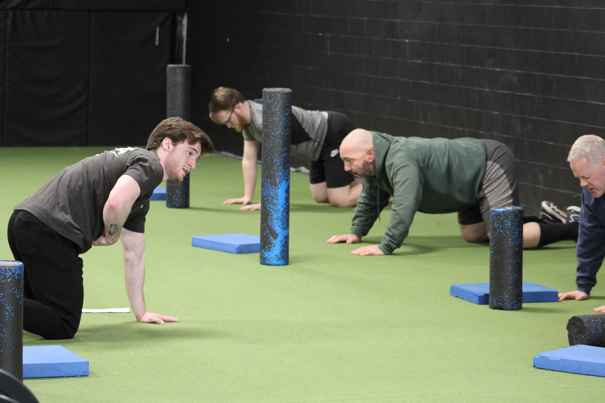 Nick leading a group training session on the turf